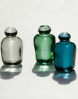 Attaché - Briefbeschwerer aus Altglas