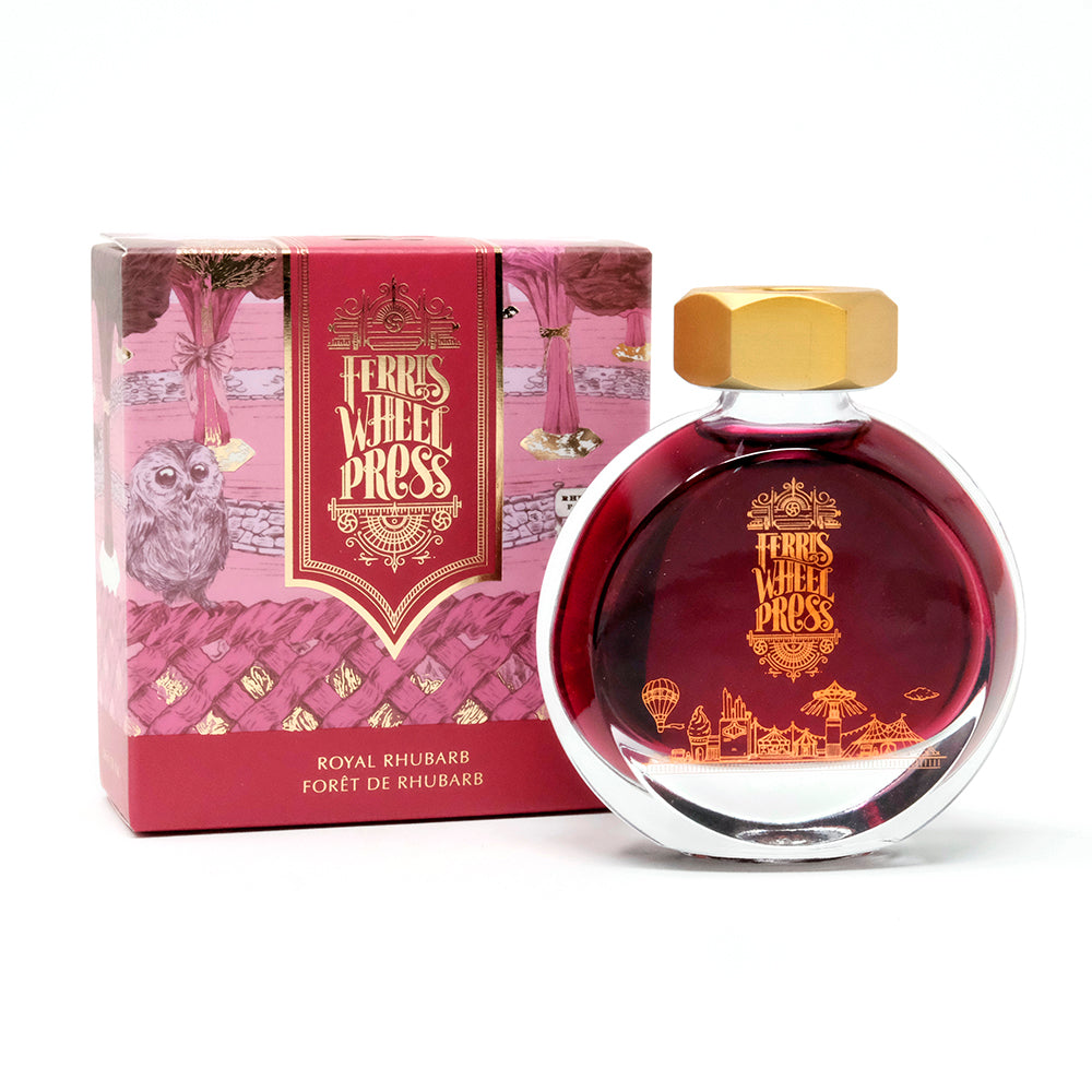 Royal Rhubarb in einer rundlichen Glasflasche mit goldenen Details neben der dazugehörigen Verpackung.